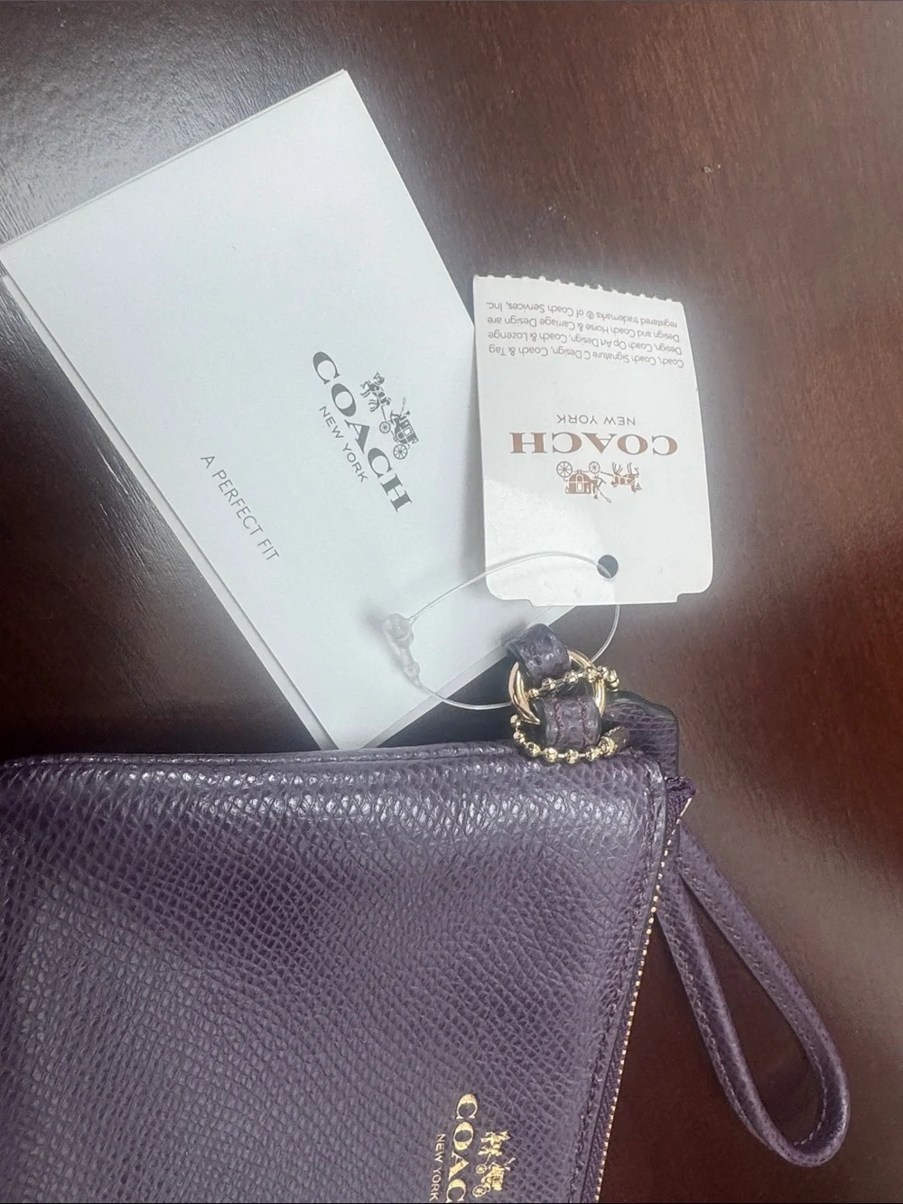 Coach clutch wristlet